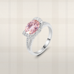 Oval pink lab diamond halo engagement ring in white gold with pavé band