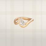 Pear cut lab diamond ring in brushed yellow gold with bypass setting