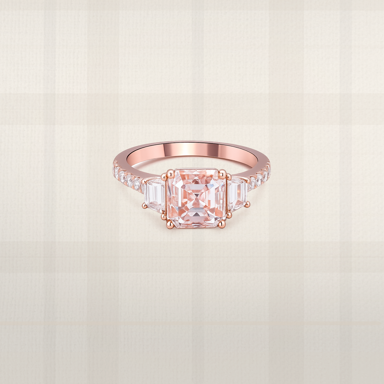 Asscher cut pink lab diamond three stone ring in rose gold with tapered baguette side stones