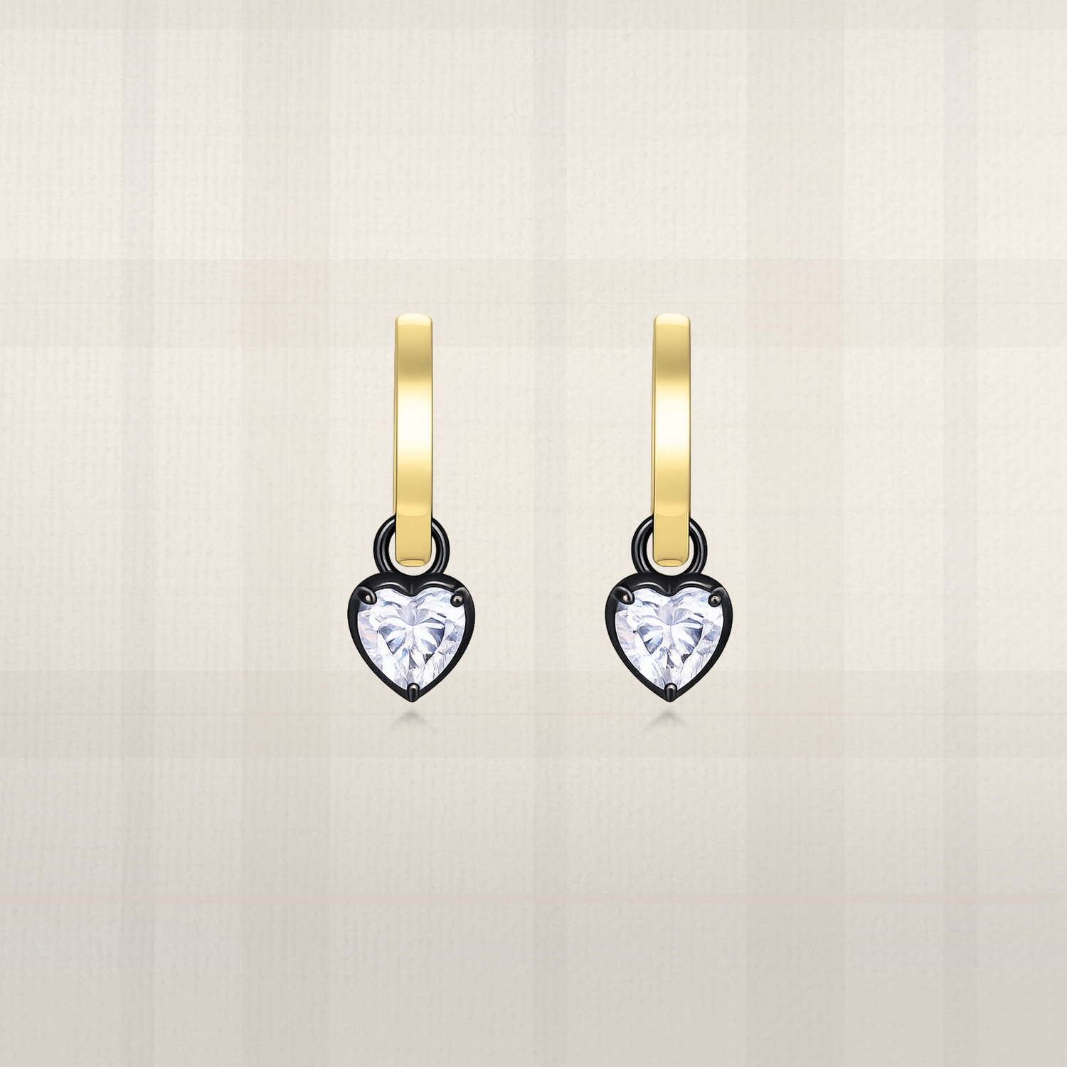 Heart cut lab diamond huggie hoop earrings in yellow gold with black prong setting