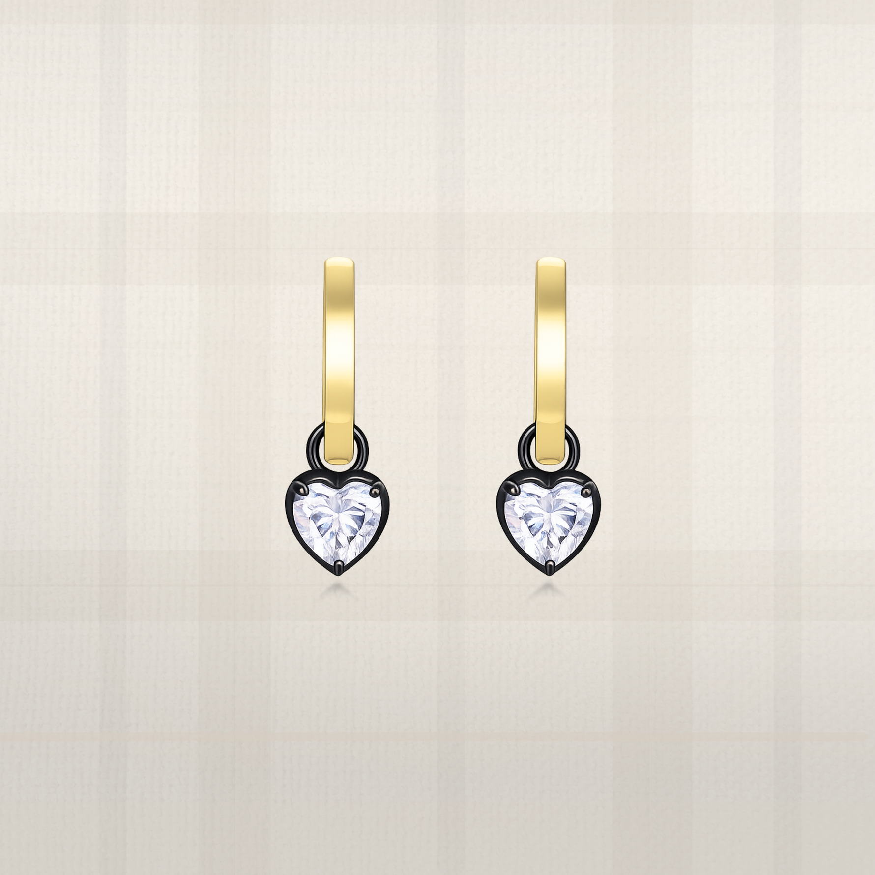 Heart cut lab diamond huggie hoop earrings in yellow gold with black prong setting
