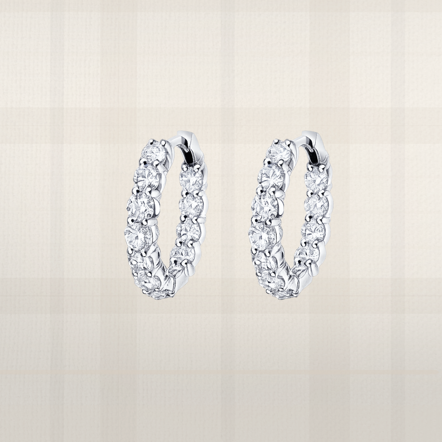 Round brilliant moissanite huggie hoop earrings in sterling silver with luxury lab diamond look