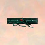 Kofsky & Stone signature green jewellery gift box with gold ribbon and red heart seal.