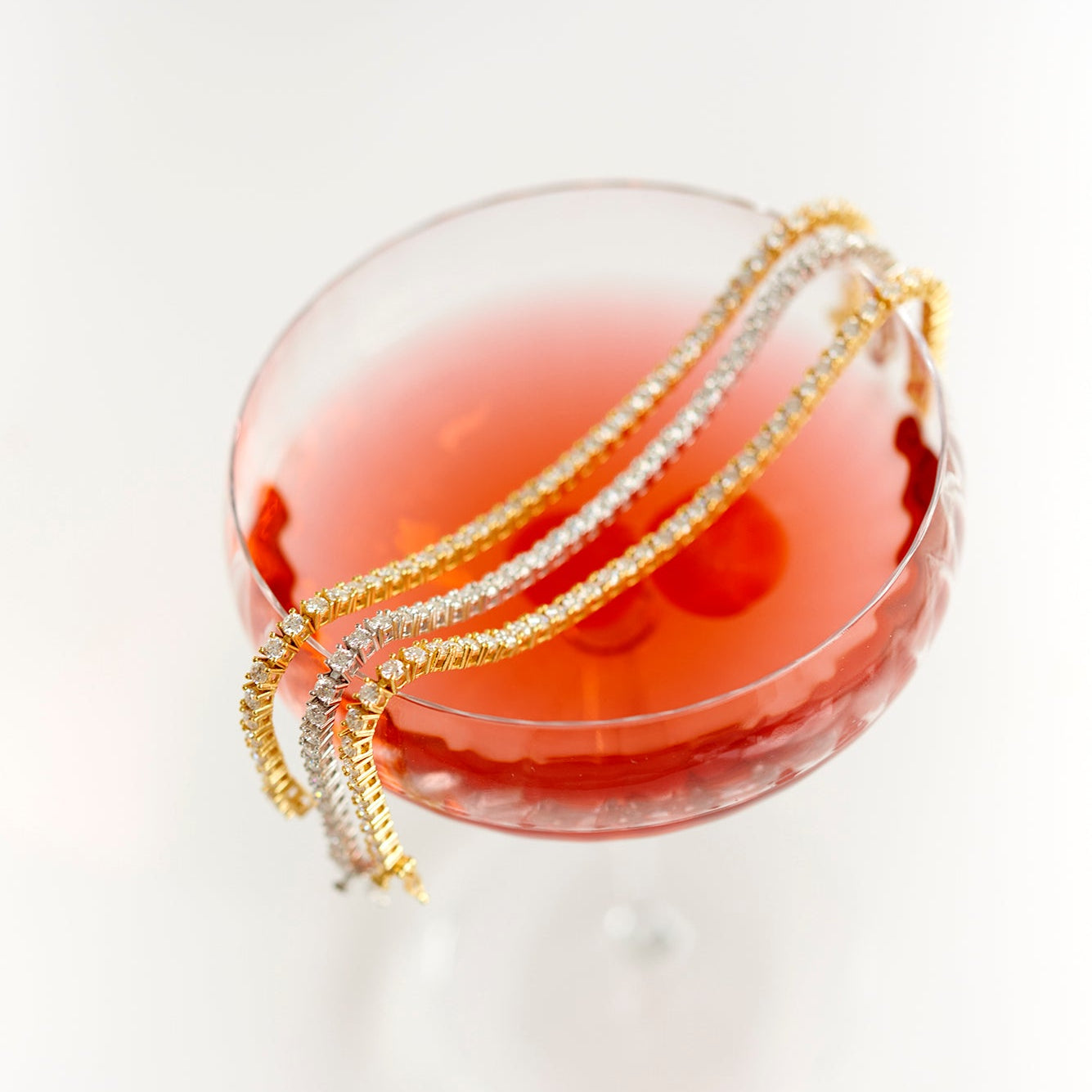 moissanite tennis bracelet in gold and silver