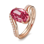 Oval pink lab diamond bypass engagement ring in rose gold with pavé band