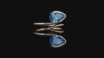 Video showing pear cut blue lab grown diamond ring in elegant gold bypass setting
