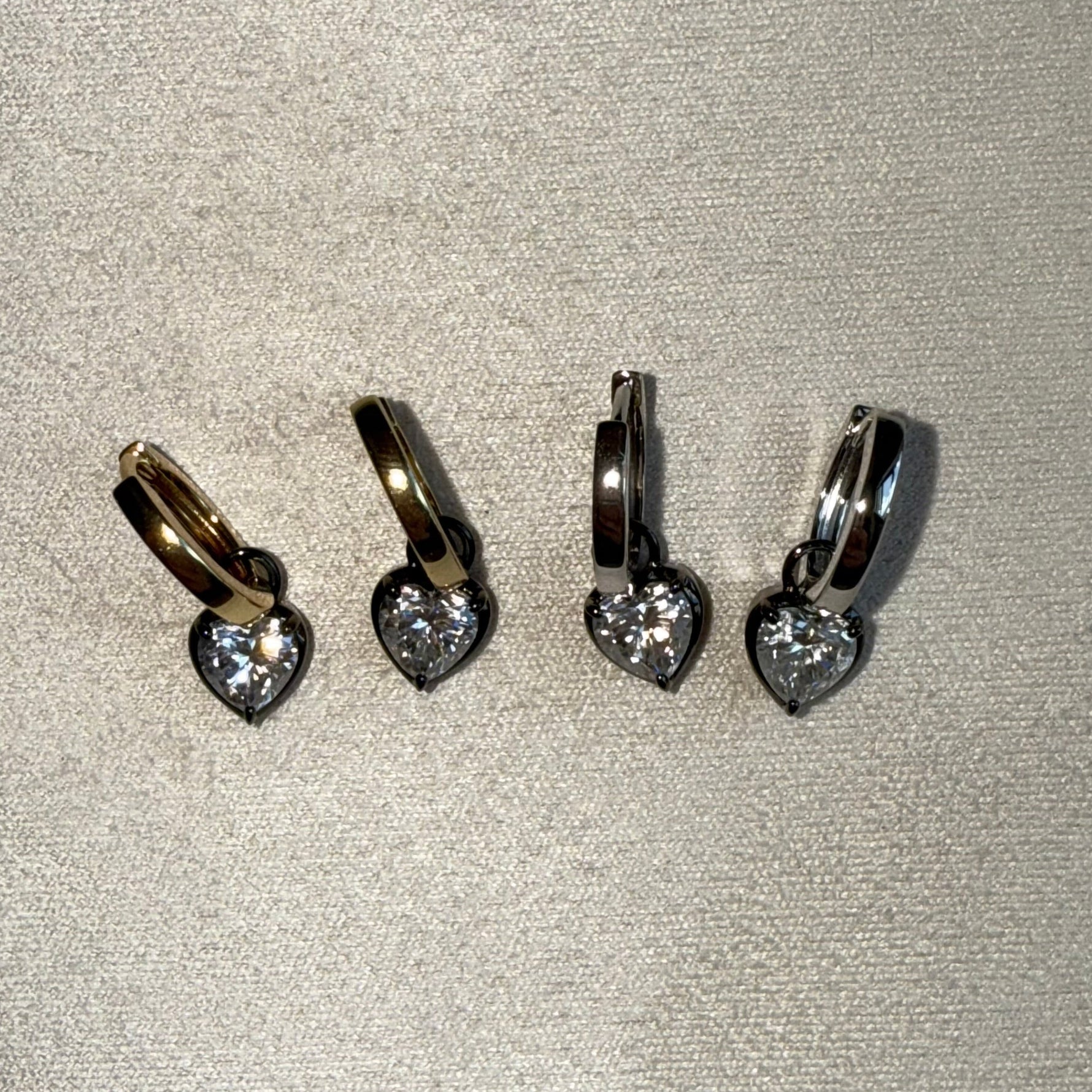 two pair of moissanite earrings